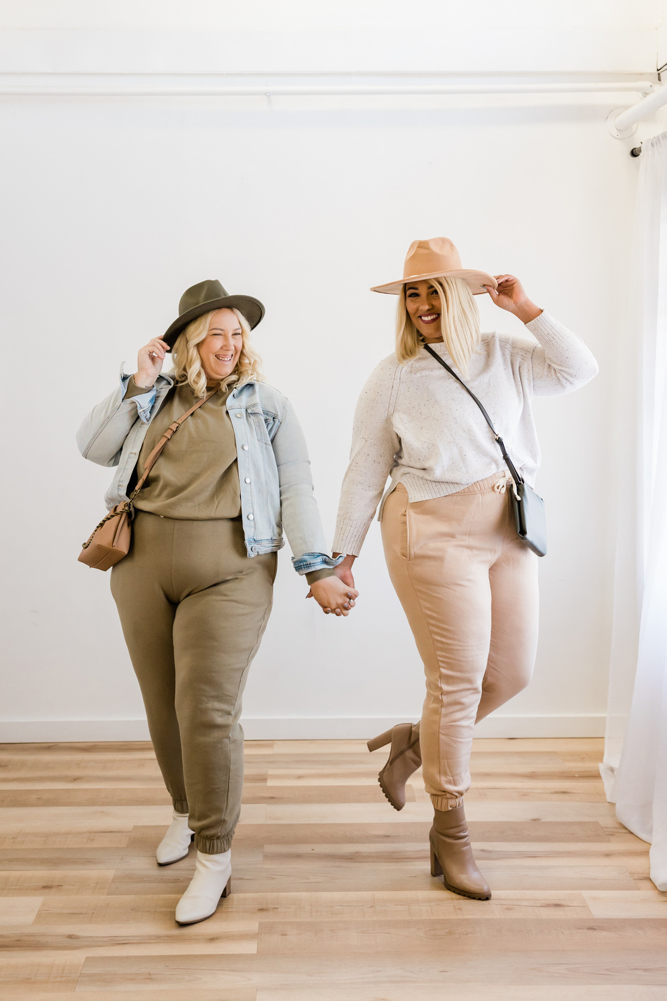 Beautiful Plus Size Women Holding Hands Indoors